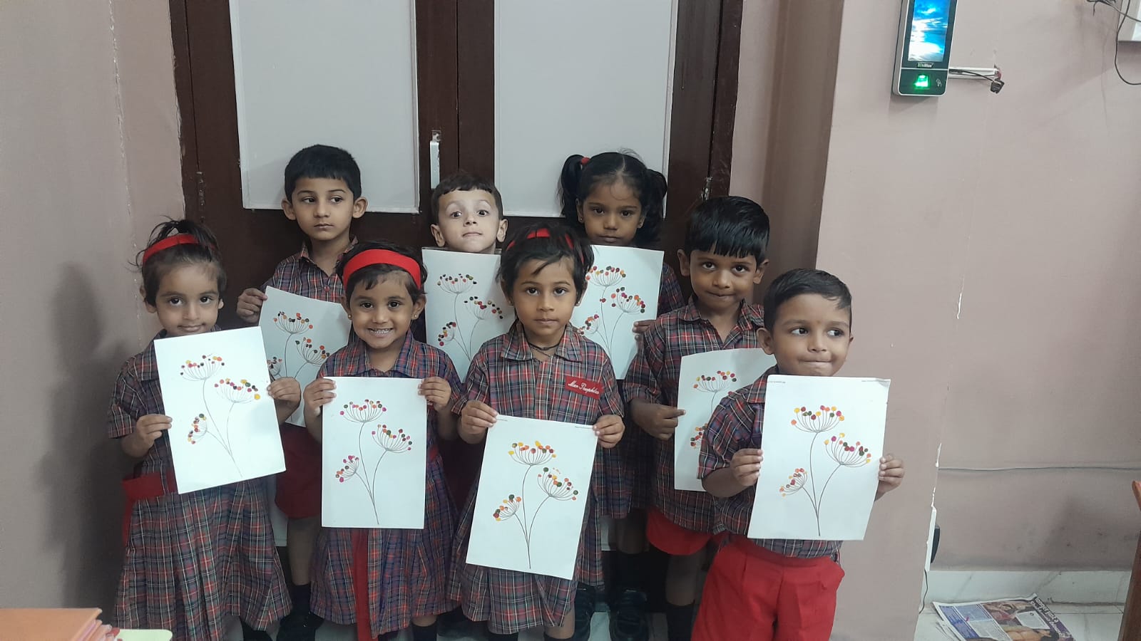 LKG - Fingerprint Flower dandelion art held by kids